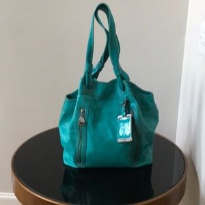 This is BCBG MaxAzria Teal/ Jade Beautiful Purse!!